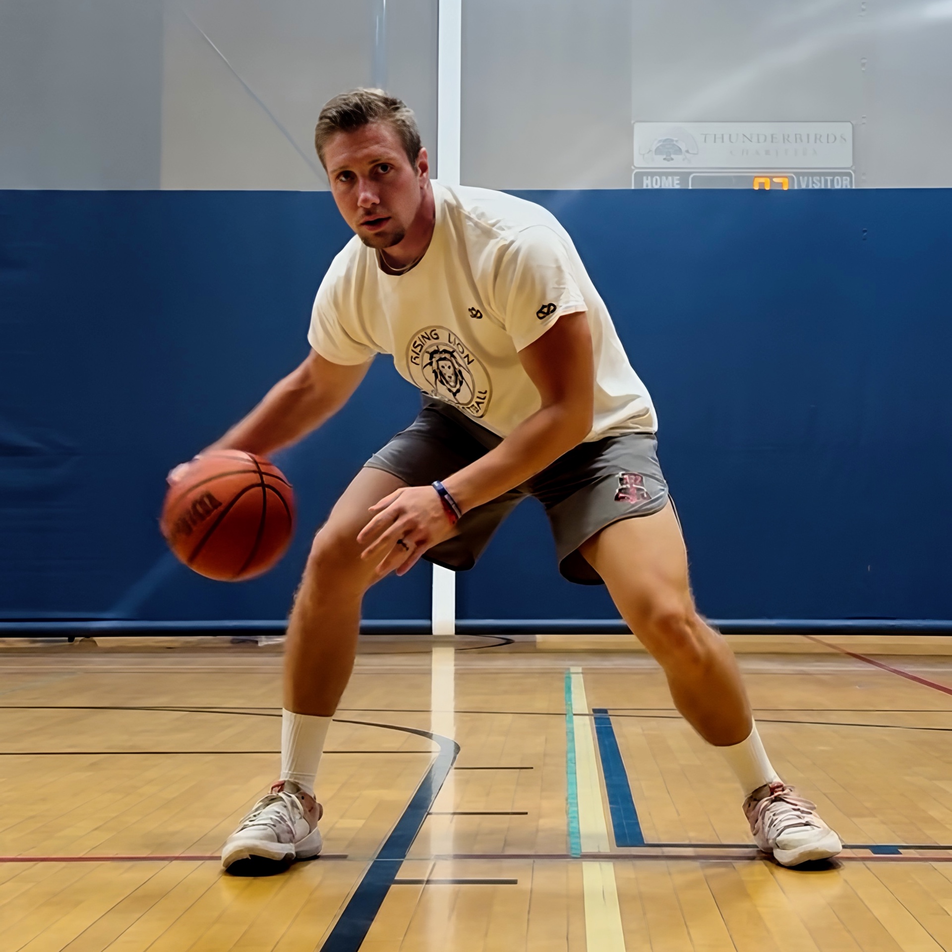 Coach at Rising Lion Fitness working on ball handling